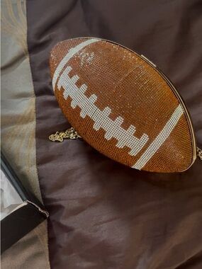 Fashion Nova Brown and White Rhinestone Football Clutch